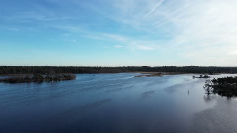 Kalmthoutse-heide-Panning-over-wetlands-revealing-the-split-of-Blue-to-white-skies