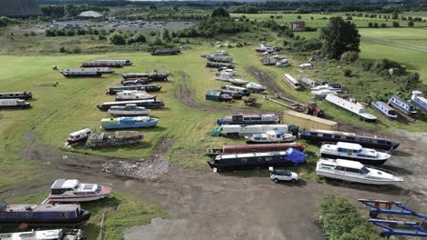 Aerial-view-over-Redhill-marina-narrow-boats-and-barge-storage-collection,-Nottingham