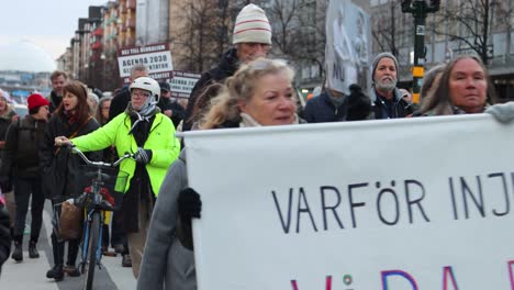 Protest-march-against-Covid-regulations-in-Stockholm,-Sweden,-static