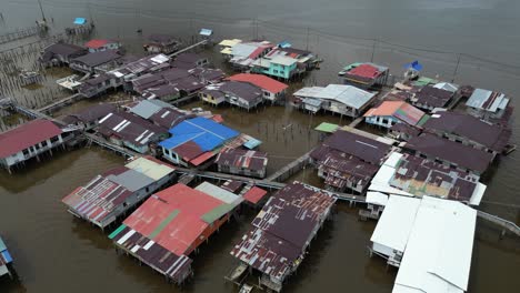 aerial-drone-shot-of-stilted-homes-and-boardwalks-in-the-floating-villages-of-Kampong-Ayer-in-Bandar-Seri-Bagawan-in-Brunei-Darussalam