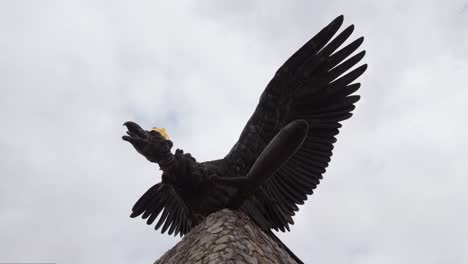 Huge-mythological-bird-sculpture,-called-Turul-as-a-national-heritage-of-Hungary-from-bottom-view-in-Tatabanya