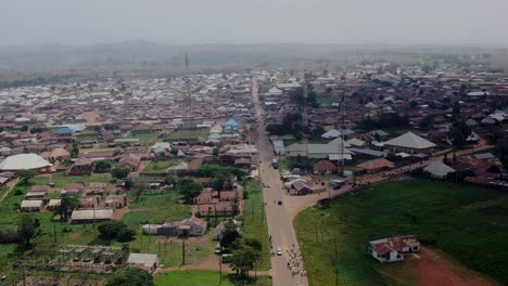Barkin-Ladi-Town-in-Nigeria's-Plateau-State---aerial-over-roads-and-neighborhoods-pullback-reveal