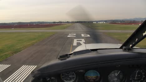 Small-Propeller-Airplane-Flying-Low-Pass-Over-Runway-Private-Pilot-POV