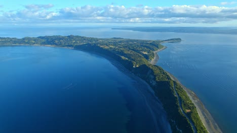 Aerial-Drone-Flyover-Lemuy-Island-Natural-Land-Channel-Bonding-Detif,-Chile,-Chiloe-4K