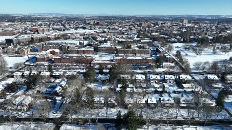 Panorama-view-of-american-town-with-houses-and-snowy-park