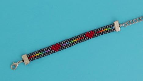 LGBT-bead-pattern-bracelet-in-blue-background