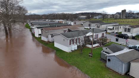 Flooded-trailer-park-on-riverbank