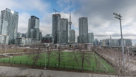 Toronto-City-Skyline-From-Canoe-Landing,-Timelapse-During-Winter