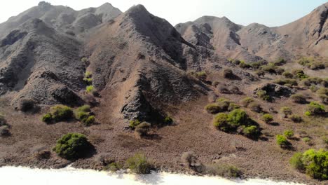 steep-rugged-mountains-at-The-Pink-Beach-On-Padar-Island-in-Komodo-National-Park,-Indonesia