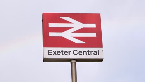 Slow-zoom-out-footage-of-the-British-Rail-signage-of-Exeter-Central-Railway-Station,-Exeter,-Devon-UK