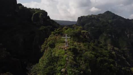 An-orbital-shot-of-the-cross-that-sits-high-above-the-Mexican-Pueblo-Magico-of-Tlayacapan