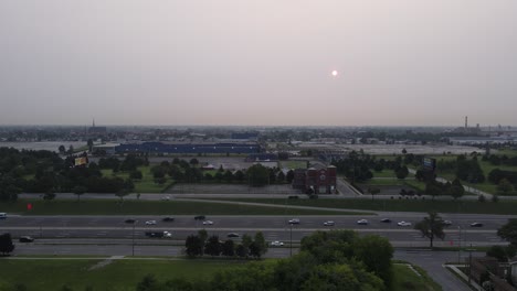 Smoke-from-Canadian-wildfires-in-2023-shade-sun-over-Detroit-Michigan,-USA