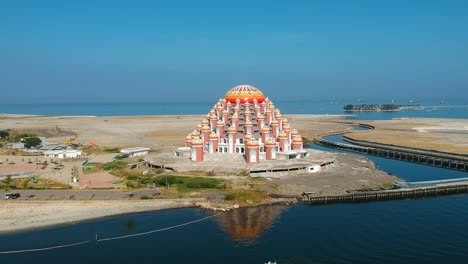 Aerial-of-unique-and-stunning-Asmaul-Husna-99-Dome-Mosque-in-Makassar,-Sulawesi,-Indonesia