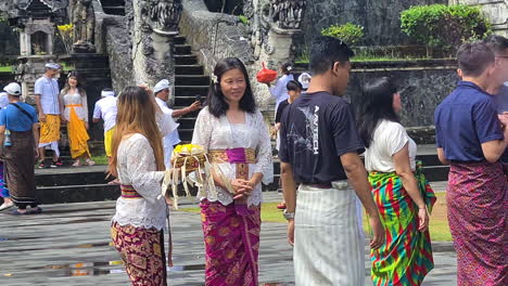 Balinese-Woman-in-Traditional-Folk-Costumes-Under-Penataran-Agung-Lempuyang-Hindu-Temple