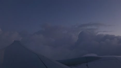 Plane-view-on-trip-to-dubai,-purple,-sunrise
