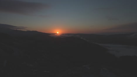 Early-morning-vibrant-sunrise-over-Munros-in-the-Trossachs-in-Scottish-highlands