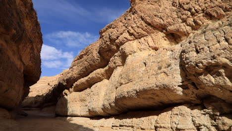 Sunlit-Mides-Canyon-walls-under-blue-sky-in-Tunisia