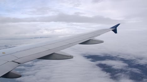 Airbus-Airliner-Plane-Wing-in-Flight-Seen-from-Passenger-Window