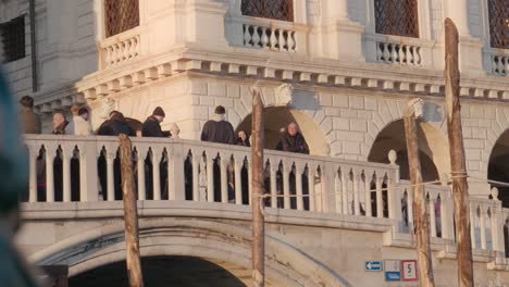 Serene-Venice-bridge-scene-with-balustrade-shadows