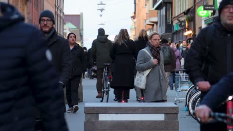 Slomo-of-people-on-pedestrian-street-Gotgatsbacken,-Stockholm,-Sweden