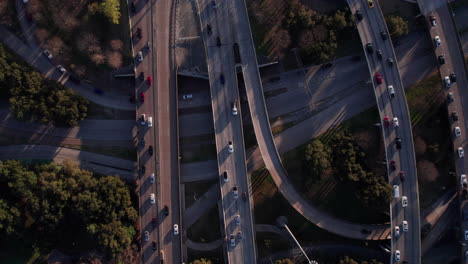 Birdseye-Aerial-View-of-Traffic-on-American-Highway-Junction-and-Overpass,-Top-Down-Drone-Shot
