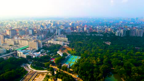 Suhrawardy-Udyan-national-memorial-park-in-metropolis-Dhaka,-Bangladesh,-aerial