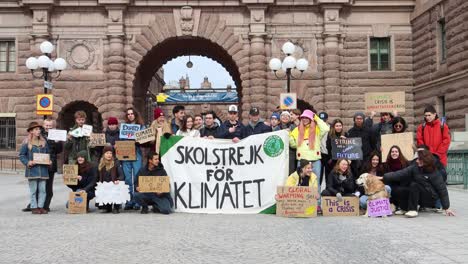 Greta-Thunberg-and-fellow-school-strikers-by-Swedish-parliament,-wide
