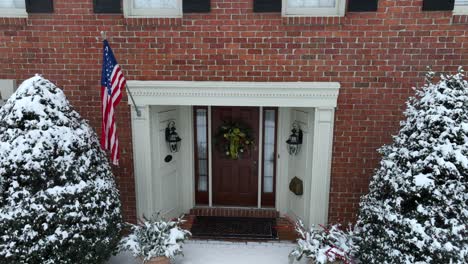 Close-up-shot-of-a-brick-house-with-American-flag