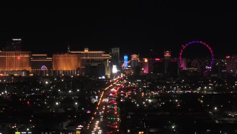 Strip-De-Las-Vegas-Por-La-Noche:-Antena-Deslizante-De-Las-Luces-Brillantes-De-Los-Casinos