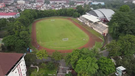 Aerial-View-of-a-Soccer-Field-in-a-City