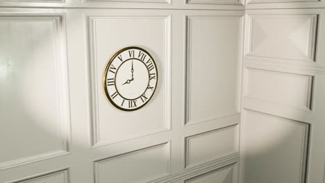 3D-animation-showing-a-clock-on-a-white-wooden-wall-inside-a-home