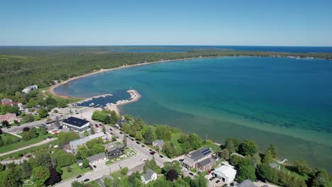 Drone-aerial-view-of-bailey's-harbor-on-a-sunny-day-in-August