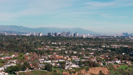 Panning-to-the-left-drone-shot-of-hollywood-and-los-angeles-from-a-distance