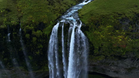 Breathtaking-View-Of-Seljalandsfoss-Waterfall-In-Iceland---Aerial-Pullback