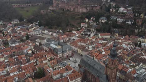 Aerial-view-of-Heidelberg-city-rooftops-and-Church-of-the-Holy-Spirit,-Germany