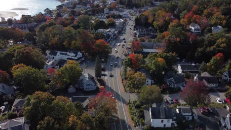 Aerial-view-of-main-road-in-Ogunquit-Maine-USA-with-car-driving-fast-on-the-coastline-of-resort-beach-town