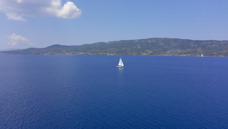 Aerial:-A-sailing-ship-is-sailing-on-the-open-blue-sea