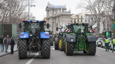 Tractors-block-the-road-at-the-Plaza-de-la-Independencia-during-a-farmer-strike-as-farmers-and-agricultural-unions-protest-against-unfair-competition,-agricultural-and-government-policies