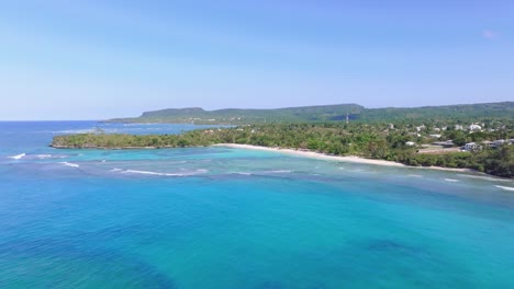 Aerial-drone-view-of-beautiful-La-Playita-beach-in-Galeras-on-the-Samana-peninsula-in-the-Dominican-Republic