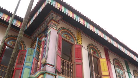 colorful-window-shutters-and-architecture-on-Tan-Teng-Niah-old-traditional-Chinese-trading-house-in-the-Little-India-neighborhood-of-downtown-Singapore-in-Asia