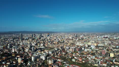 Cityscape-Majesty:-Tirana's-Skyline-in-Full-Panoramic-View,-Showcasing-the-Urban-Fabric-and-Architectural-Brilliance-of-the-Capital