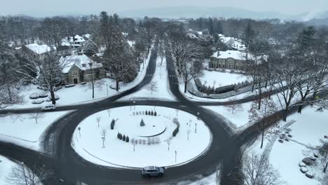 Aerial-flyover-of-a-traffic-circle-roundabout