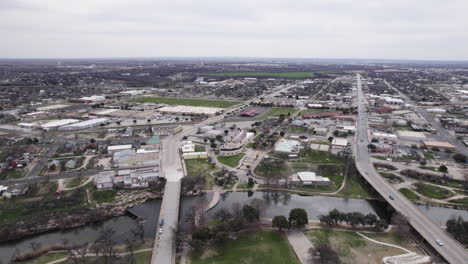 Aerial-drone-shot-of-San-Angelo,-Texas-Historic-Downtown-and-the-Concho-River