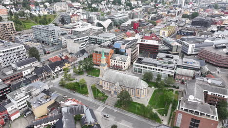 Aerial-View-of-Tromso-Cathedral-and-Downtown-Neighborhood,-Norway