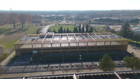 Aerial-establishing-shot-of-a-newly-constructed-car-park-in-Saint-Chamand