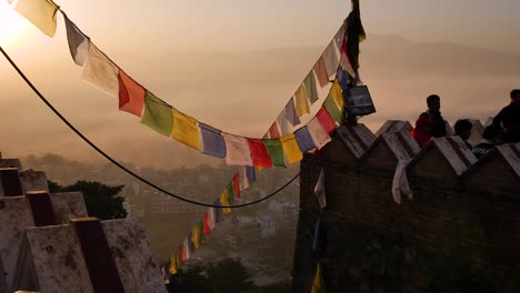 Prayer-flags-at-the-main-entrance-to-the-Monkey-Temple-at-sunrise,-Kathmandu,-Nepal