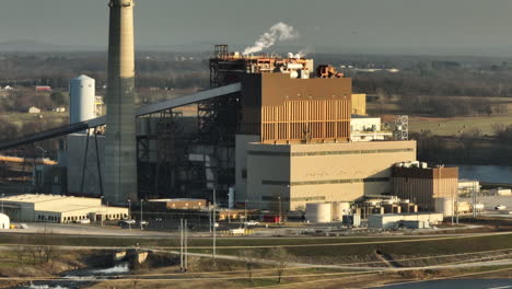 Sunset-glow-on-Flint-Creek-Power-Plant-by-Lake-Swepco,-Arkansas,-clear-sky,-industrial-scene