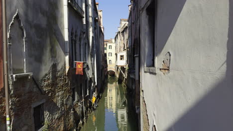 Beautiful-view-of-Venice-canal-and-buildings-with-water-reflection