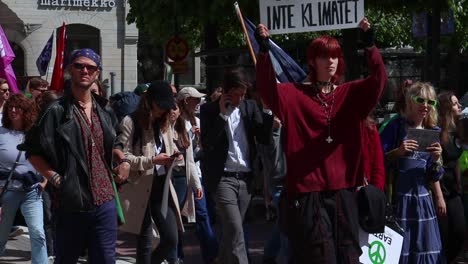 Slomo-of-young-people-at-climate-protest-march-in-Stockholm,-Sweden