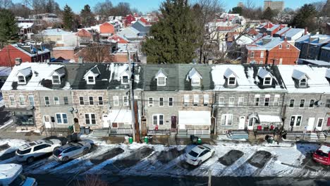 Aerial-lateral-shot-showing-row-of-american-houses-in-neighborhood